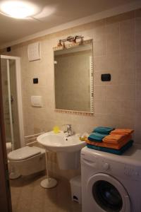 Koupelna v ubytování La Casa della Coccinella + 43 fotografií