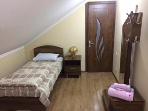 Letto o letti in una camera di Mari Guest House