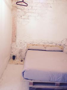 Postel nebo postele na pokoji v ubytování Apartments San Ignacio de Loyola