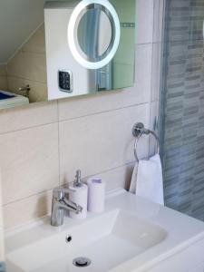 Koupelna v ubytování Navis Luxury Apartments