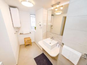 Koupelna v ubytování Navis Luxury Apartments