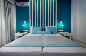 Posteľ alebo postele v izbe v ubytovaní Gaia in Style - Adults Only
