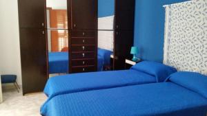 Postel nebo postele na pokoji v ubytování La Casa sopra il Mare