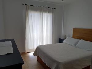 Posteľ alebo postele v izbe v ubytovaní Vivienda Vacacional Monteprimero 2