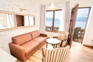 Uma área de estar em Forte Rose Hotel