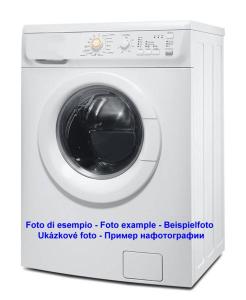 a white washing machine with a black door at Lignano cheap in Lignano Sabbiadoro