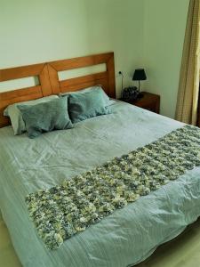 Llit o llits en una habitació de Apartamento Valle Golf Resort