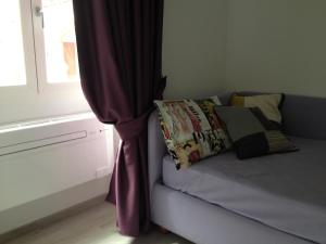 A bed or beds in a room at Suite Luisa Roma