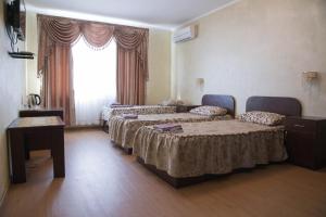 Postel nebo postele na pokoji v ubytování Guest House Montreal
