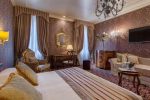Postel nebo postele na pokoji v ubytování Hotel Ca' dei Conti