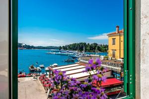 a view of a harbor with boats in the water at Rosina Sea View Apartment in Rovinj