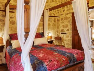 Posteľ alebo postele v izbe v ubytovaní Helios Garden Boutique Apartments