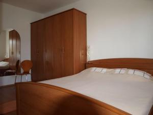 Postel nebo postele na pokoji v ubytování Villa Triton