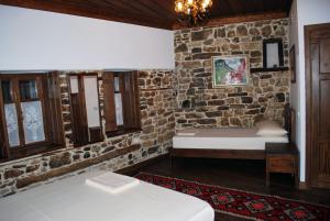 Postel nebo postele na pokoji v ubytování Hotel Boutique Osumi
