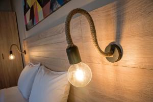 Una cama o camas en una habitación de Sirene Villas