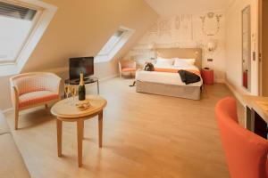Ένα ή περισσότερα κρεβάτια σε δωμάτιο στο Hotel Montbriand Antony - Ancien Alixia +66 φωτογραφίες