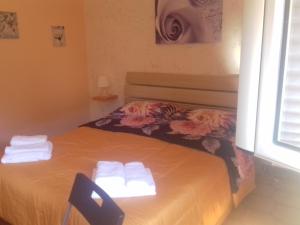 Katil atau katil-katil dalam bilik di Bed and fly Aeroporto Catania reception h24