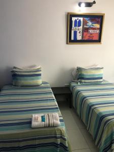 מיטה או מיטות בחדר ב-Hotel Las Residentas