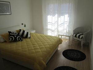 Un pat sau paturi într-o cameră la House Marijana Sibenik