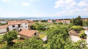 an aerial view of a village with houses and trees at Lovely Sea View House in Malinska Island Krk in Malinska