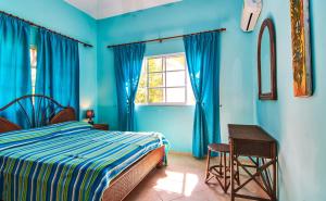 Postel nebo postele na pokoji v ubytování Hispaniola Residencial + 153 fotografií