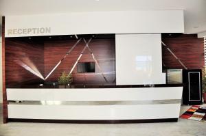 a lobby with a reception desk in a building at Seren Sari Hotel in Marmaris