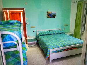 Postel nebo postele na pokoji v ubytování Hotel Ulisse + 29 fotografií