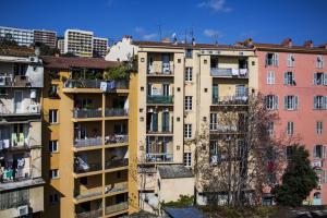 an apartment building in the city of paris at Hotel le Dauphin in Ajaccio