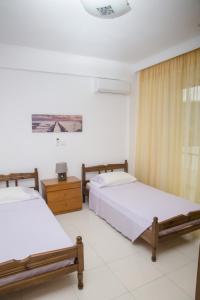 Postel nebo postele na pokoji v ubytování Aggeli Village House