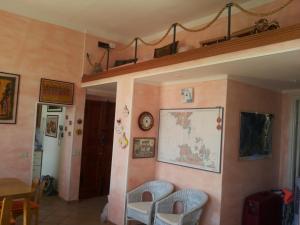 Posedenie v ubytovaní Casa vacanze della Maddalena