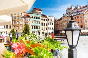 a view of a city with buildings and a street light at ClickTheFlat Royal Park Apart Rooms in Warsaw