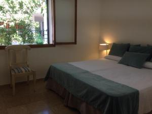 Postel nebo postele na pokoji v ubytování Playa de Palma Beach House