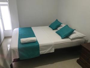 Postel nebo postele na pokoji v ubytování Mayva AprtaHotel