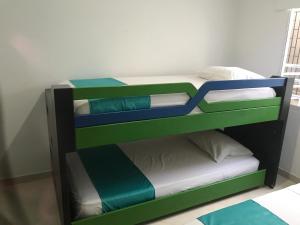 Postel nebo postele na pokoji v ubytování Mayva AprtaHotel