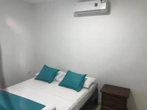 Postel nebo postele na pokoji v ubytování Mayva AprtaHotel