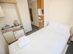 FLEXSTAY  東十條旅館房間的床
