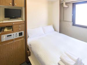 FLEXSTAY  東十條旅館房間的床