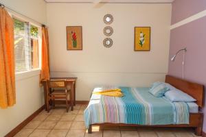 Voodi või voodid majutusasutuse Hotel Brasilito toas