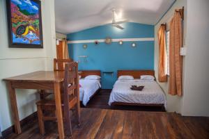 Voodi või voodid majutusasutuse Hotel Brasilito toas