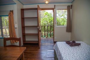 Voodi või voodid majutusasutuse Hotel Brasilito toas