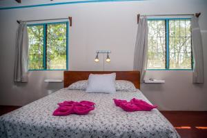 Voodi või voodid majutusasutuse Hotel Brasilito toas