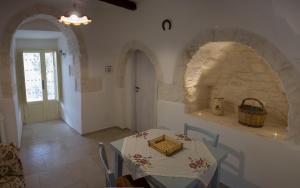 Posezení v ubytování Masseria Trulli sull'Aia