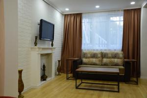 TV a/nebo společenská místnost v ubytování Old Tbilisi Narikala Apartment