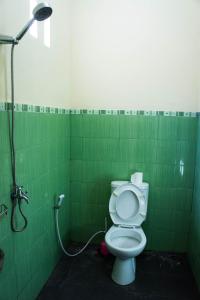 Kupatilo u objektu Sri Beach Inn