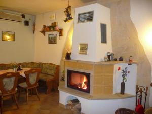 Area soggiorno di Pension Am Weinberg Sächsische Schweiz