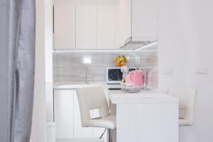 Kuchyň nebo kuchyňský kout v ubytování Studio Apartment Lena