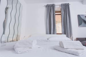 Postel nebo postele na pokoji v ubytování Studio Apartment Lena