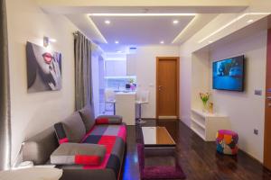 TV a/nebo společenská místnost v ubytování Studio Apartment Lena