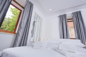 Postel nebo postele na pokoji v ubytování Studio Apartment Lena