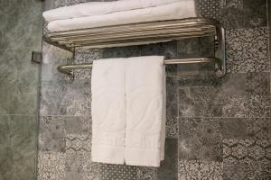 Koupelna v ubytování Bonsella Hotel